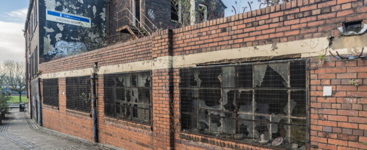 Commercial building with damage from weather