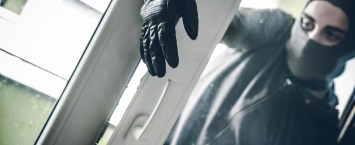 Burglar Breaking Into House